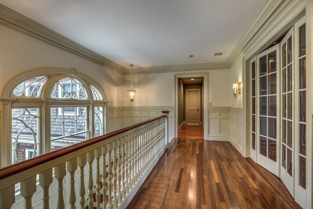 7 Percy Road Lexington, MA 02421 - Photo 24 of 29 a view of gallery with wooden floor