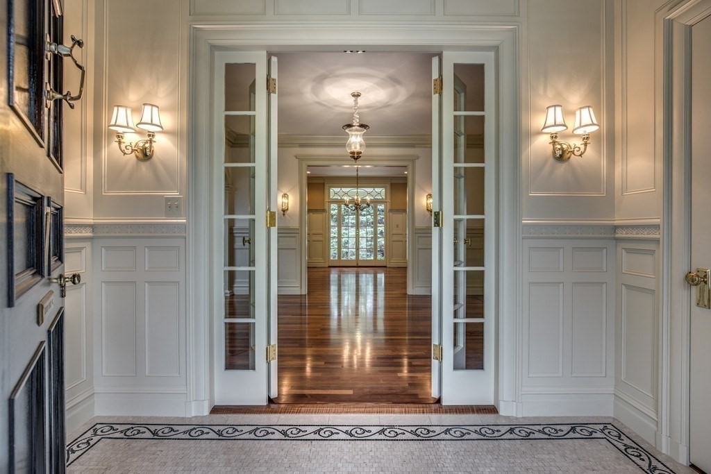 7 Percy Road Lexington, MA 02421 - Photo 5 of 29 a view of a hallway with a glass door