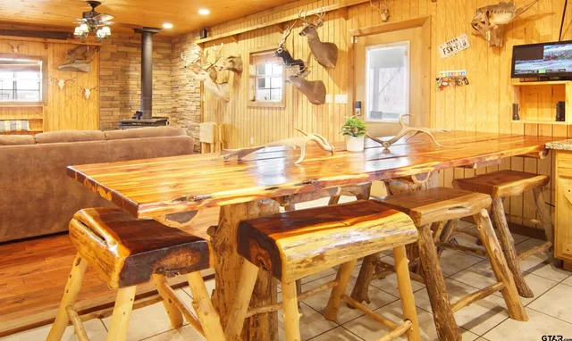 a kitchen with stainless steel appliances granite countertop a sink and a counter