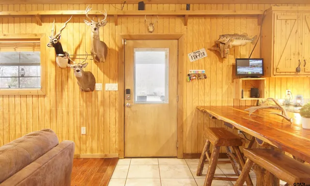 a kitchen with stainless steel appliances granite countertop a sink and cabinets
