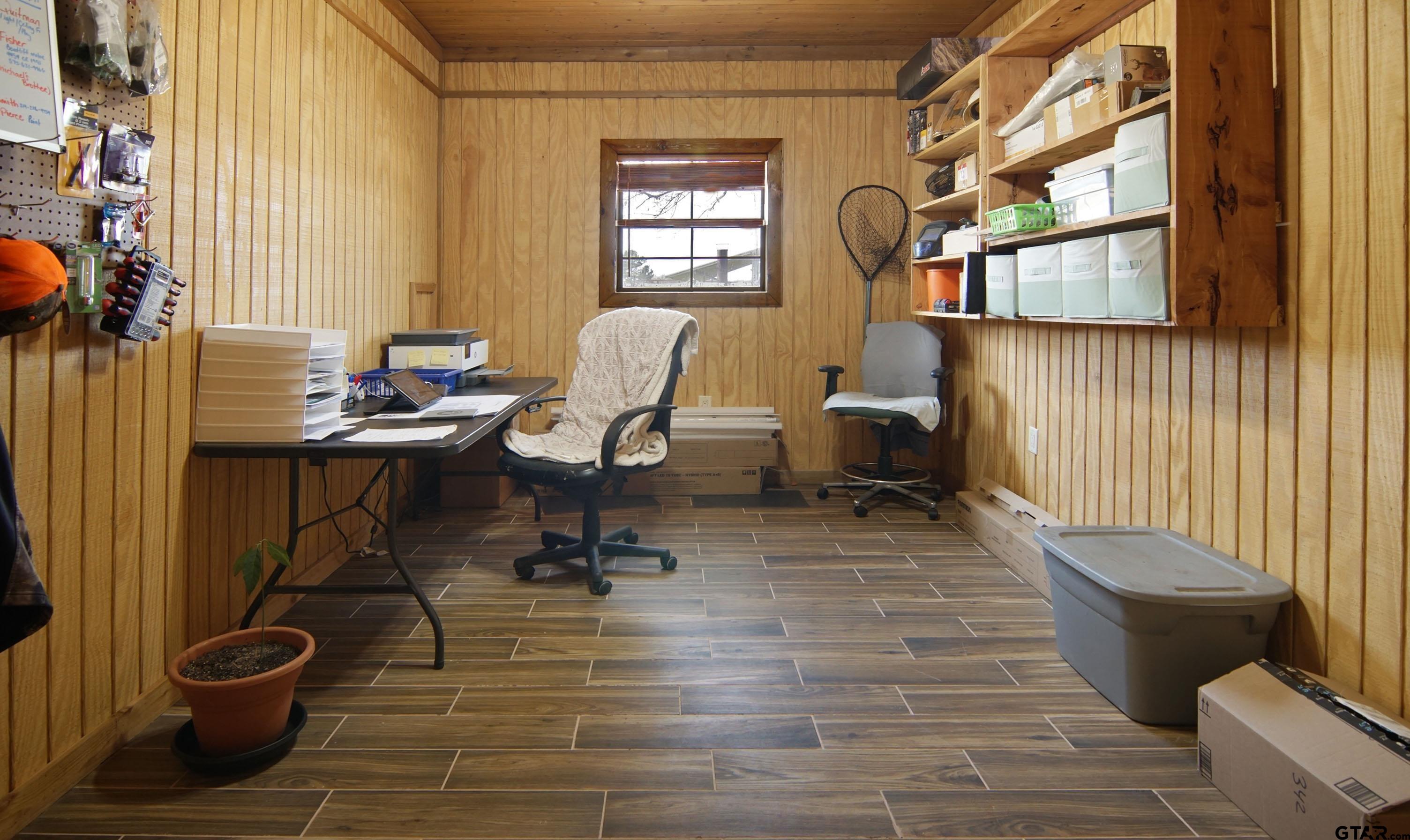 342 Rscr 3345 Emory, TX 75440 - Photo 22 of 31 a view of a workspace with furniture and a window