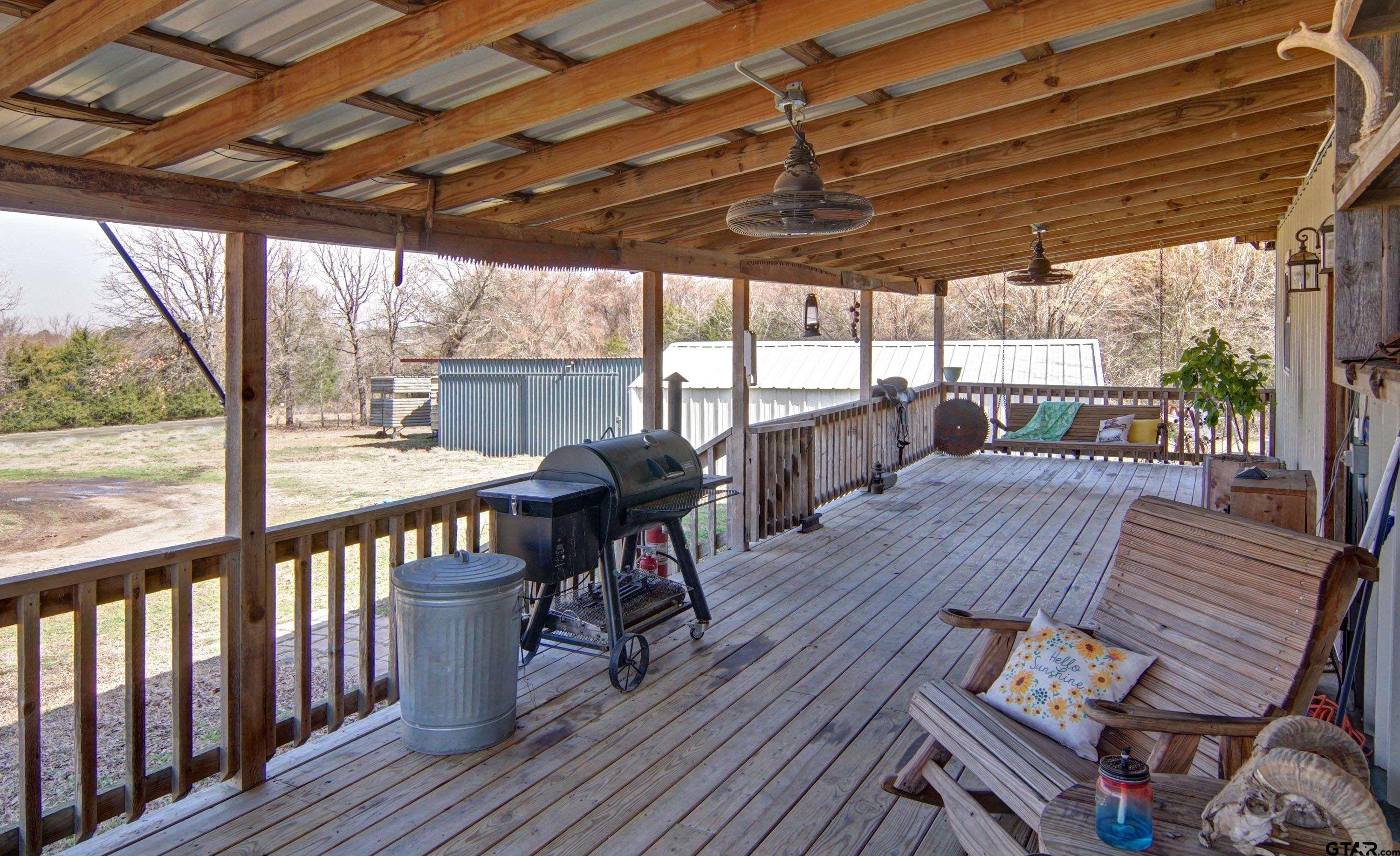 342 Rscr 3345 Emory, TX 75440 - Photo 7 of 31 a view of a patio with wooden floor of a house