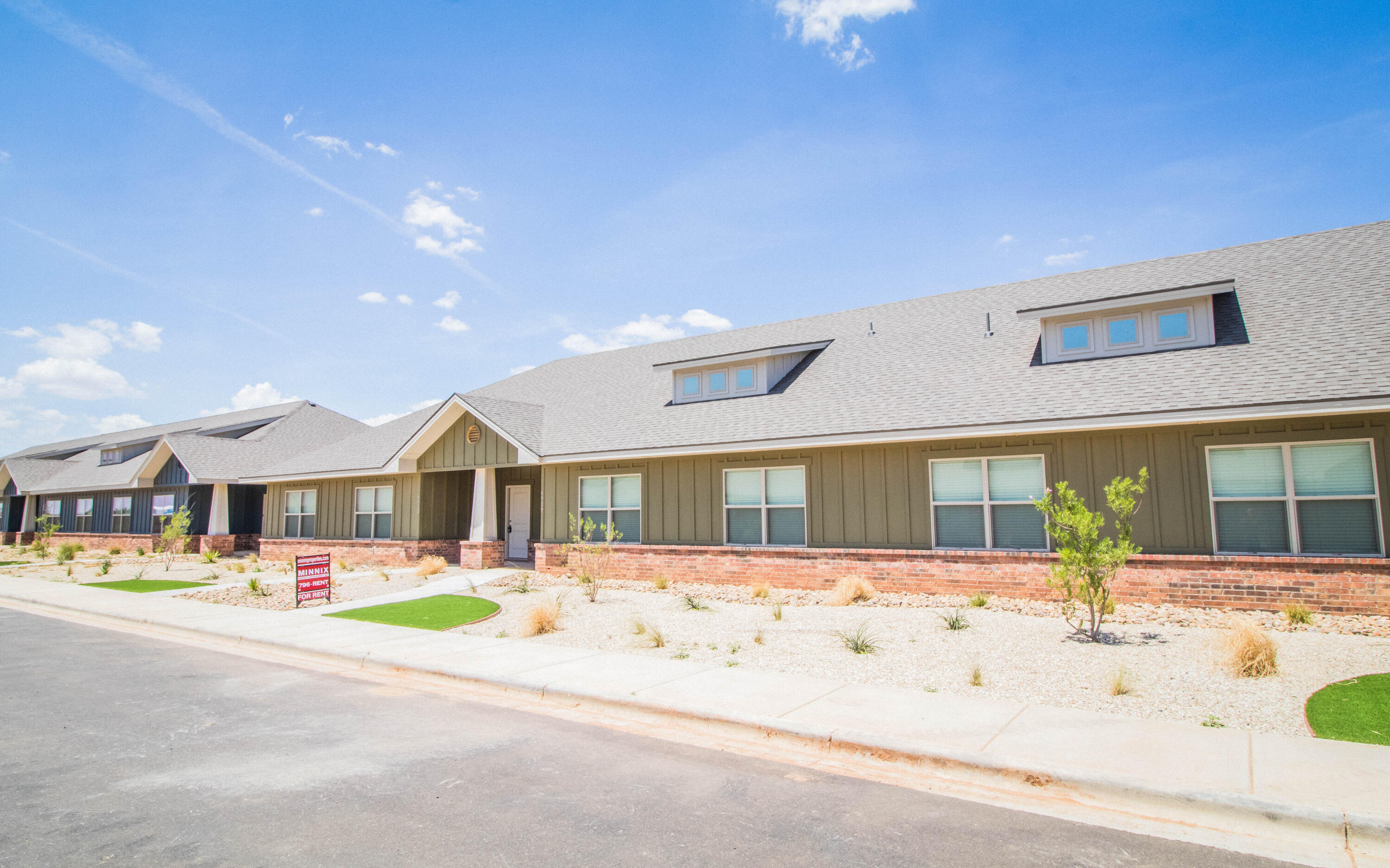 6914 21st Street Lubbock, TX 79407 - Photo 33 of 36 a front view of a building with street view