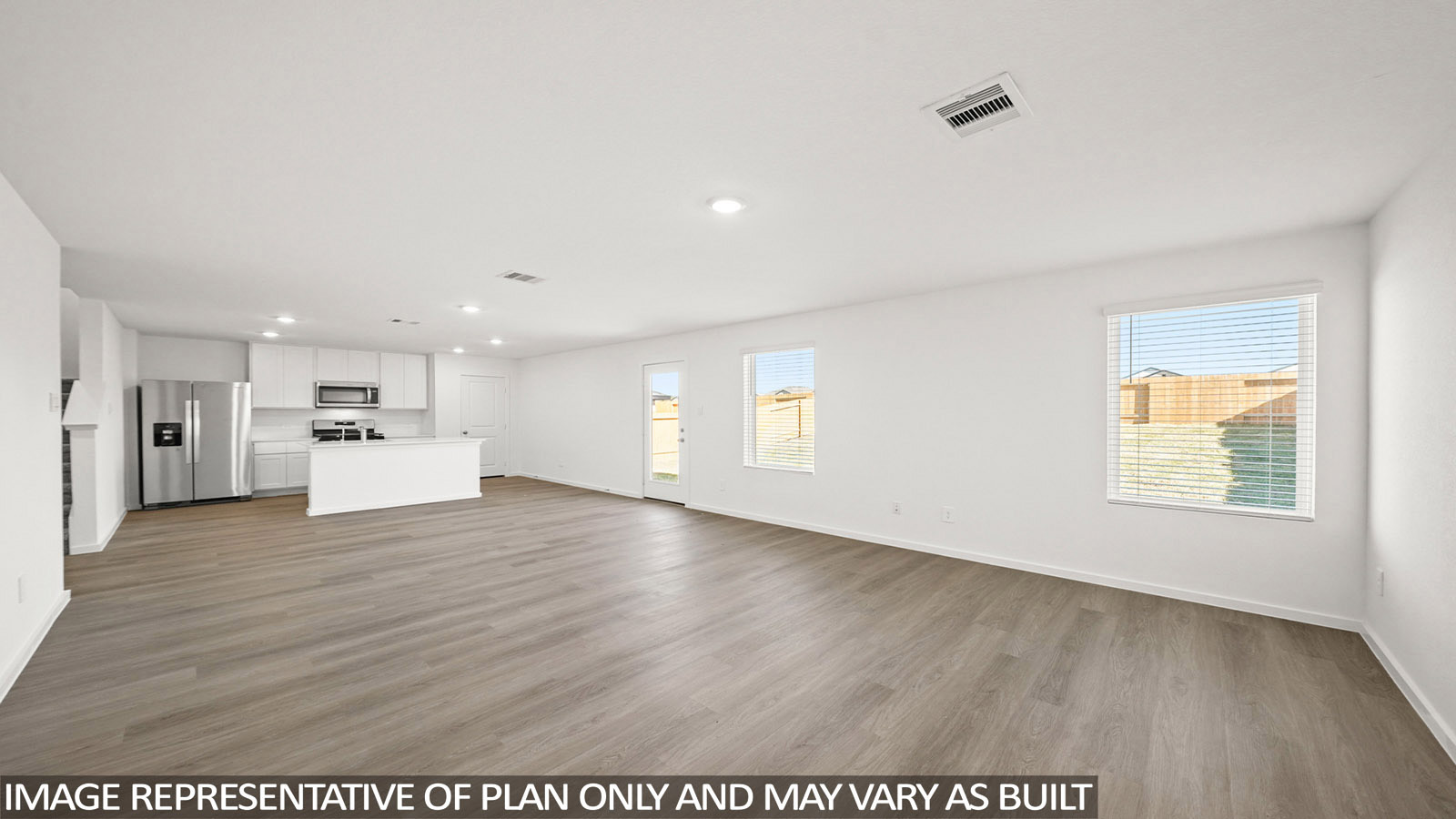 116 Baby Calf Roping Road Jarrell, TX 76537 - Photo 7 of 23 An open-concept interior offers seamless flow between living, dining, and kitchen areas.
