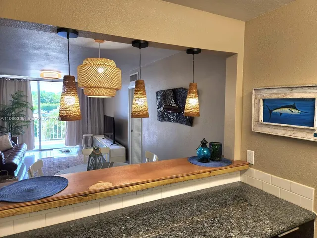 a bedroom with bed and window