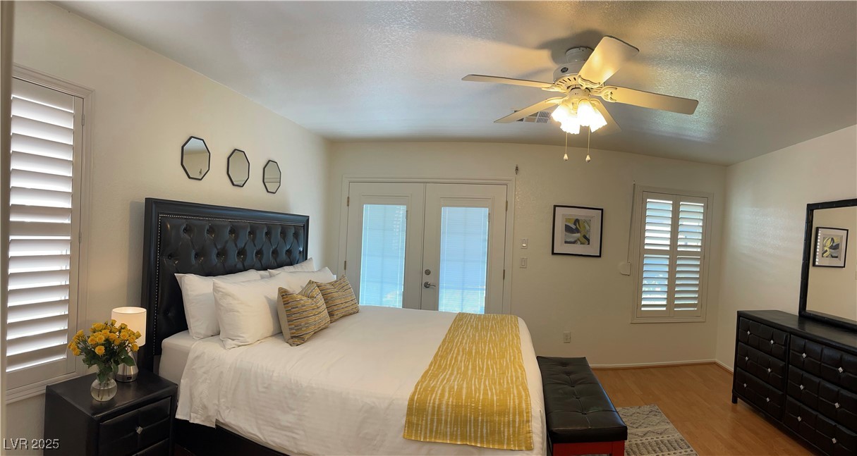 Undisclosed Address Las Vegas, NV 89118 - Photo 12 of 19 Bedroom with ceiling fan, wood finished floors, ac