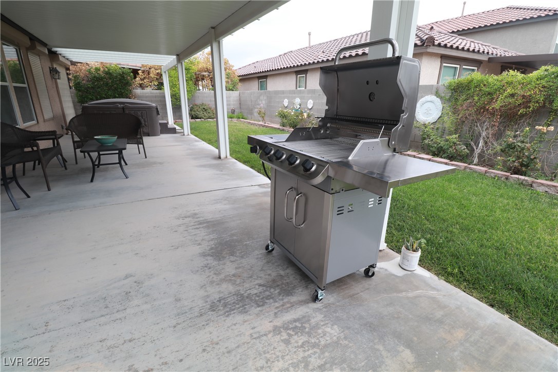 Undisclosed Address Las Vegas, NV 89118 - Photo 17 of 19 View of patio / terrace featuring a fenced backyar