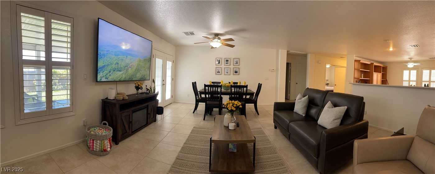 Undisclosed Address Las Vegas, NV 89118 - Photo 2 of 19 Living area with light tile patterned floors, ceil
