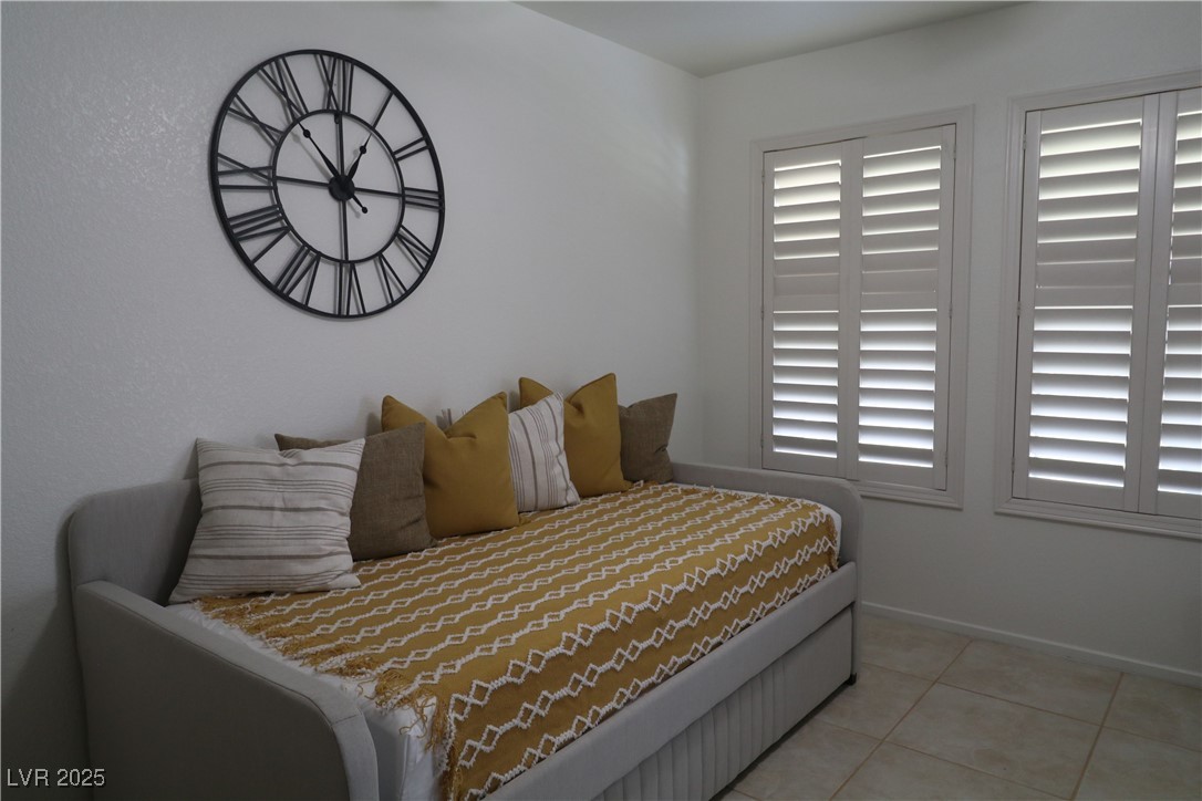 Undisclosed Address Las Vegas, NV 89118 - Photo 5 of 19 Bedroom with light tile patterned flooring and bas