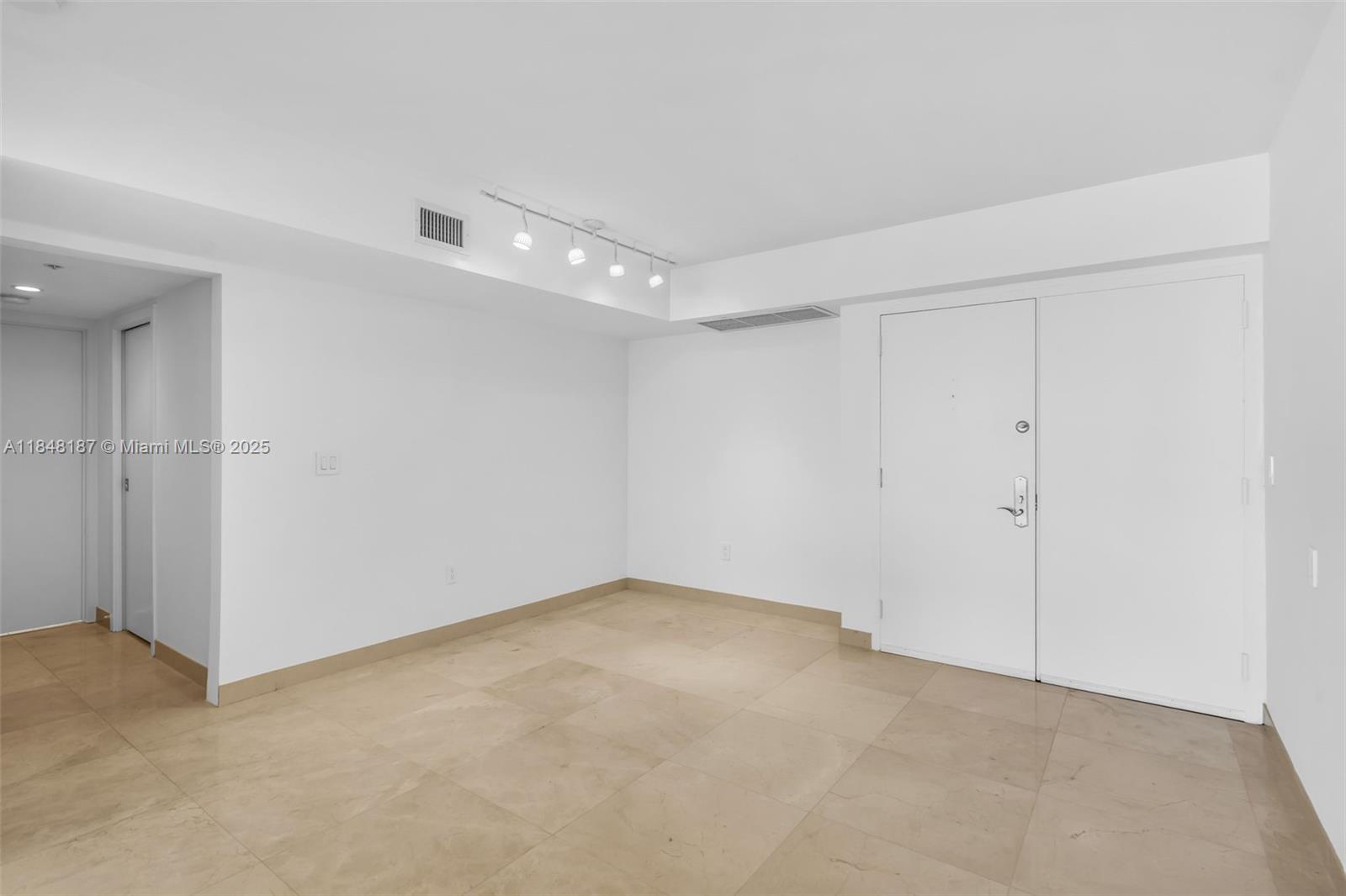 6301 Collins Avenue, Unit 1903 Miami Beach, FL 33141 - Photo 13 of 45 a view of an empty room