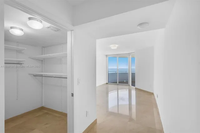 an empty room with closet