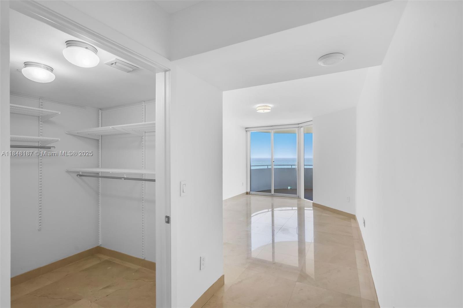 6301 Collins Avenue, Unit 1903 Miami Beach, FL 33141 - Photo 15 of 45 a view of a hallway