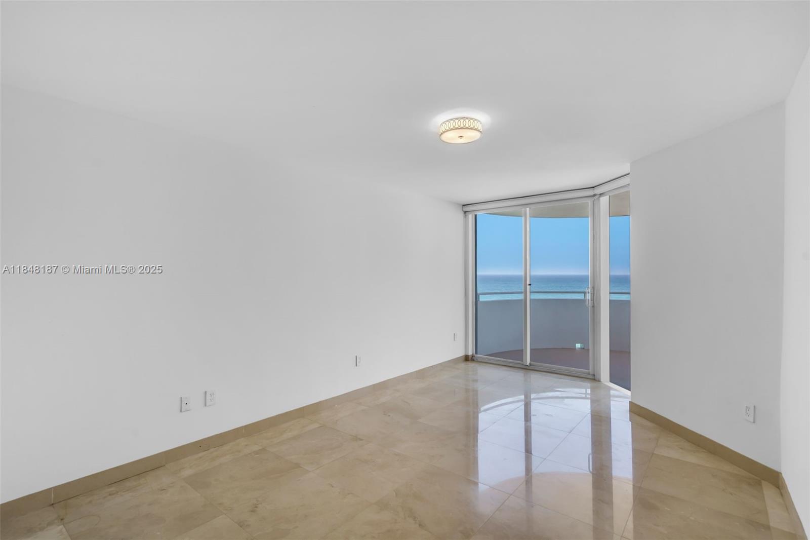 6301 Collins Avenue, Unit 1903 Miami Beach, FL 33141 - Photo 16 of 45 an empty room with closet