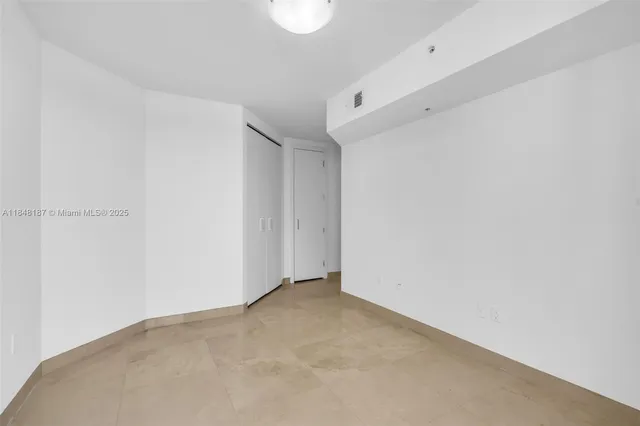 an empty room with closet