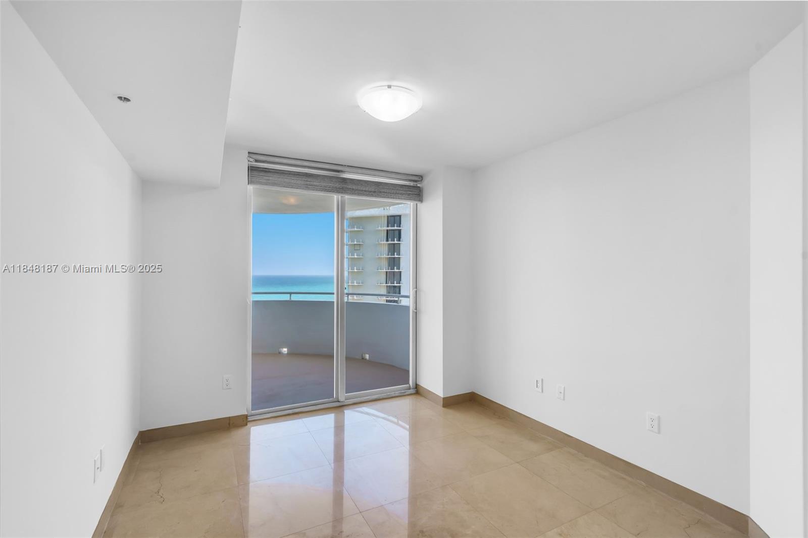 6301 Collins Avenue, Unit 1903 Miami Beach, FL 33141 - Photo 23 of 45 an empty room with closet