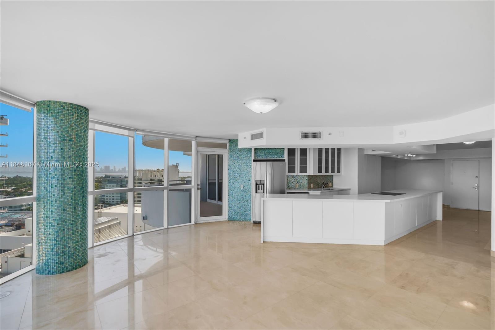 6301 Collins Avenue, Unit 1903 Miami Beach, FL 33141 - Photo 6 of 45 a view of kitchen with furniture and refrigerator