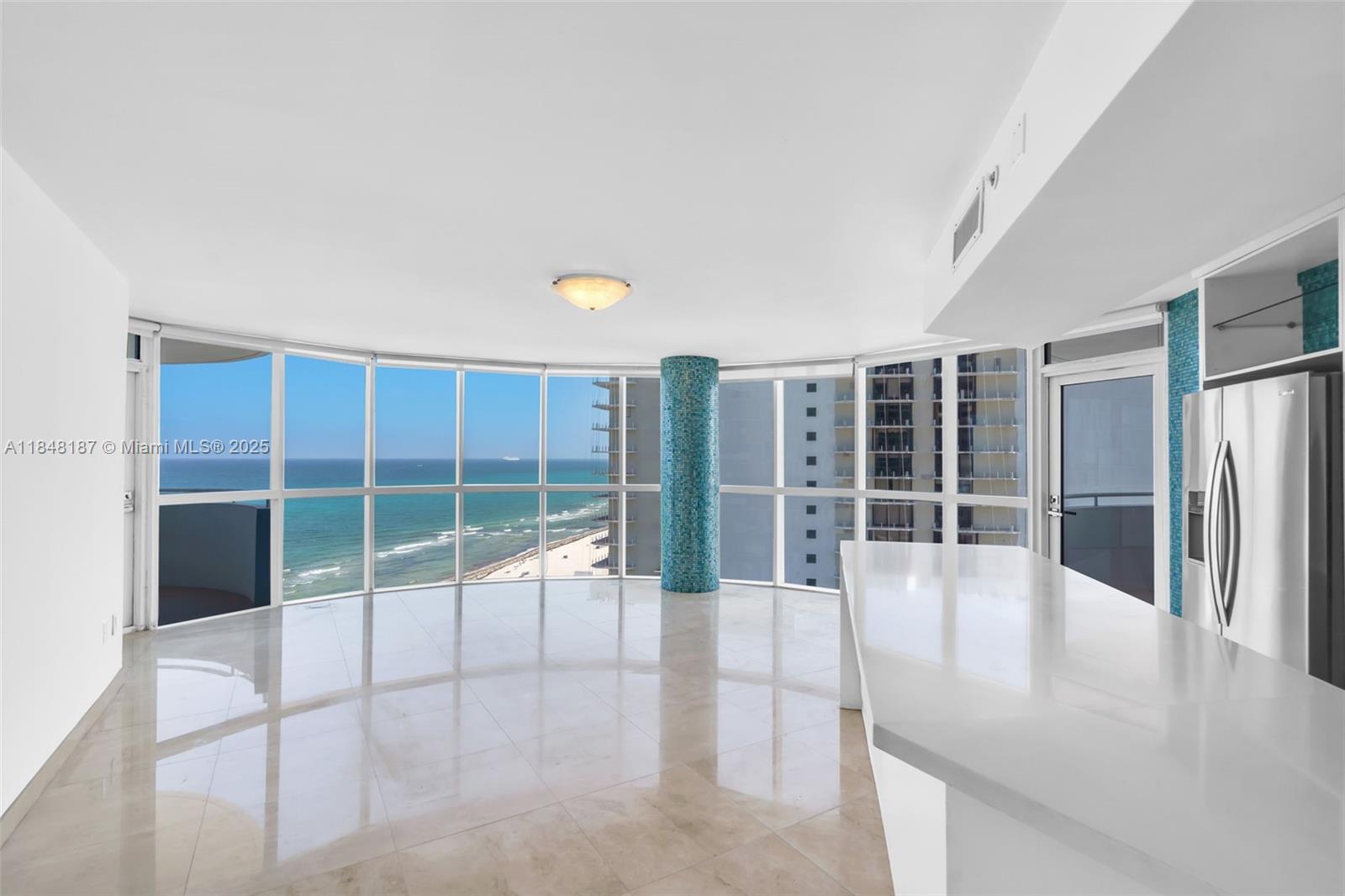 6301 Collins Avenue, Unit 1903 Miami Beach, FL 33141 - Photo 7 of 45 a view of a livingroom with a large window