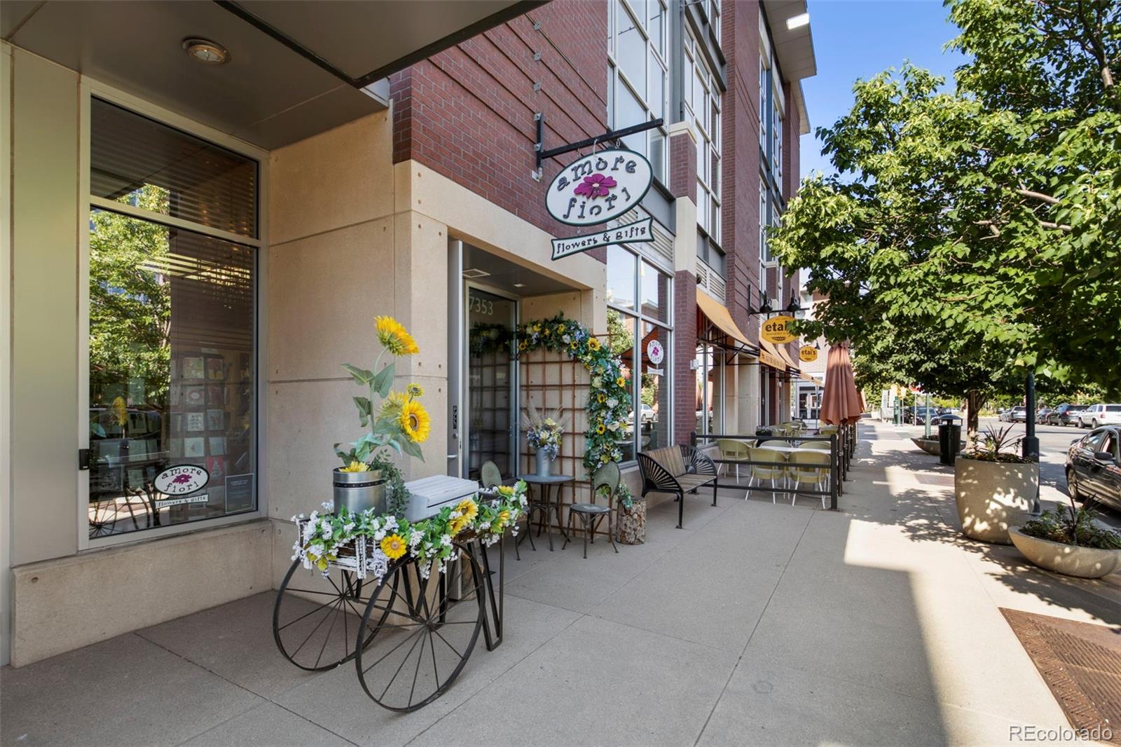 2826 Syracuse Court Denver, CO 80238 - Photo 33 of 35 a view of multiple house with outdoor seating