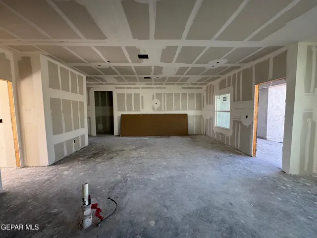 a picture of a bench in front of building