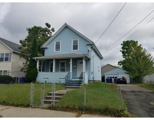 69 Lyons Street Springfield, MA 01151 - Photo 1 of 11 a front view of a house with a yard