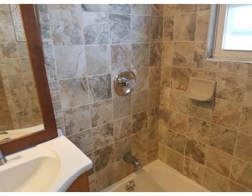 69 Lyons Street Springfield, MA 01151 - Photo 6 of 11 a bathroom with a shower