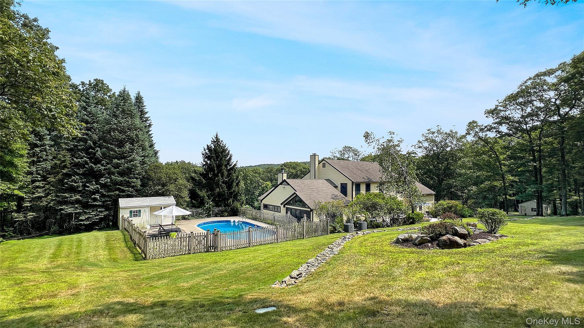 701 Highway 301 Cold Spring, NY 10516 - Photo 19 of 19 a view of swimming pool with seating space