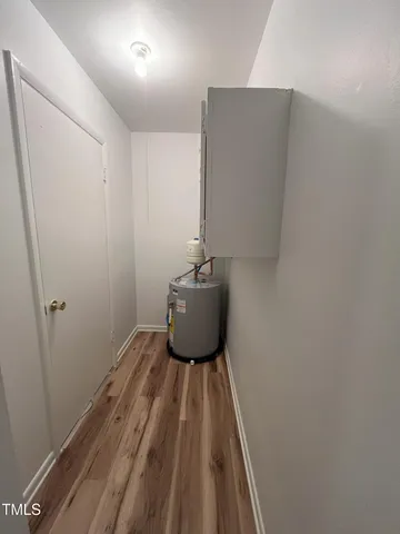 a hallway with a sink