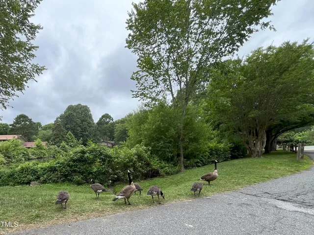 a bathroom with a sink a toilet and bathtub