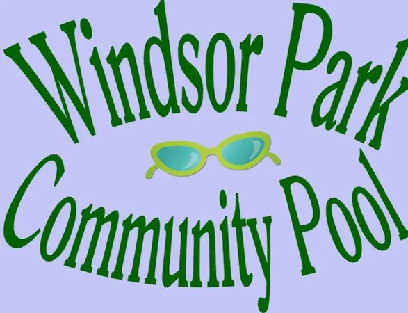 a view of a tennis ground with a park