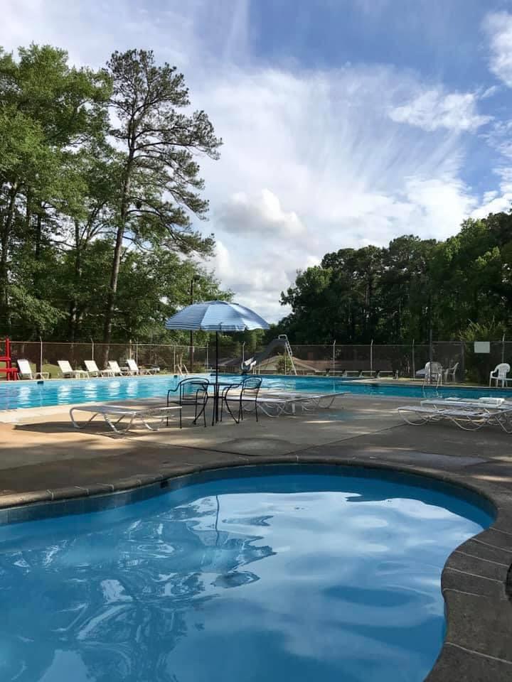 3636 Denewood Court Columbus, GA 31909 - Photo 26 of 26 a view of yard with swimming pool and trees in the background