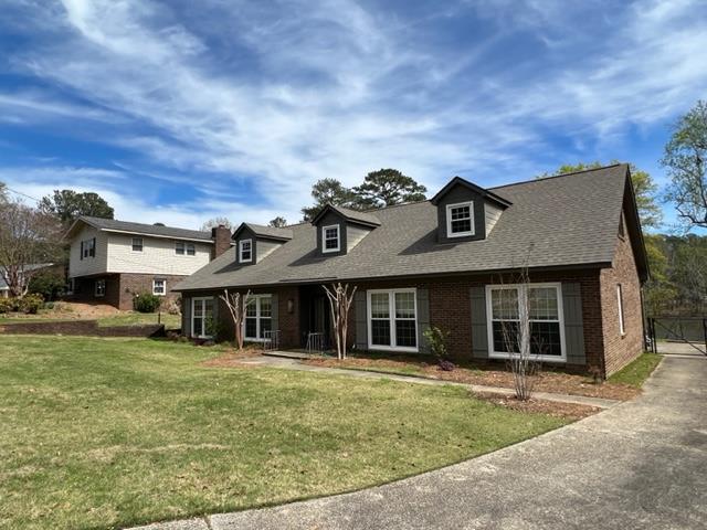3636 Denewood Court Columbus, GA 31909 - Photo 3 of 26 a front view of a house with a yard