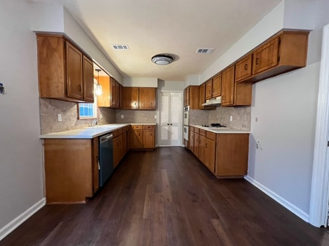3636 Denewood Court Columbus, GA 31909 - Photo 9 of 26 a kitchen with stainless steel appliances granite countertop a sink a stove and a refrigerator