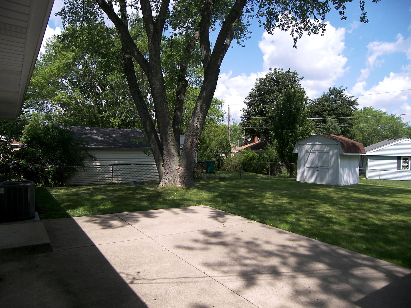 8 Crescent Road Lake Zurich, IL 60047 - Photo 16 of 17 a view of a yard in front of a house with large trees
