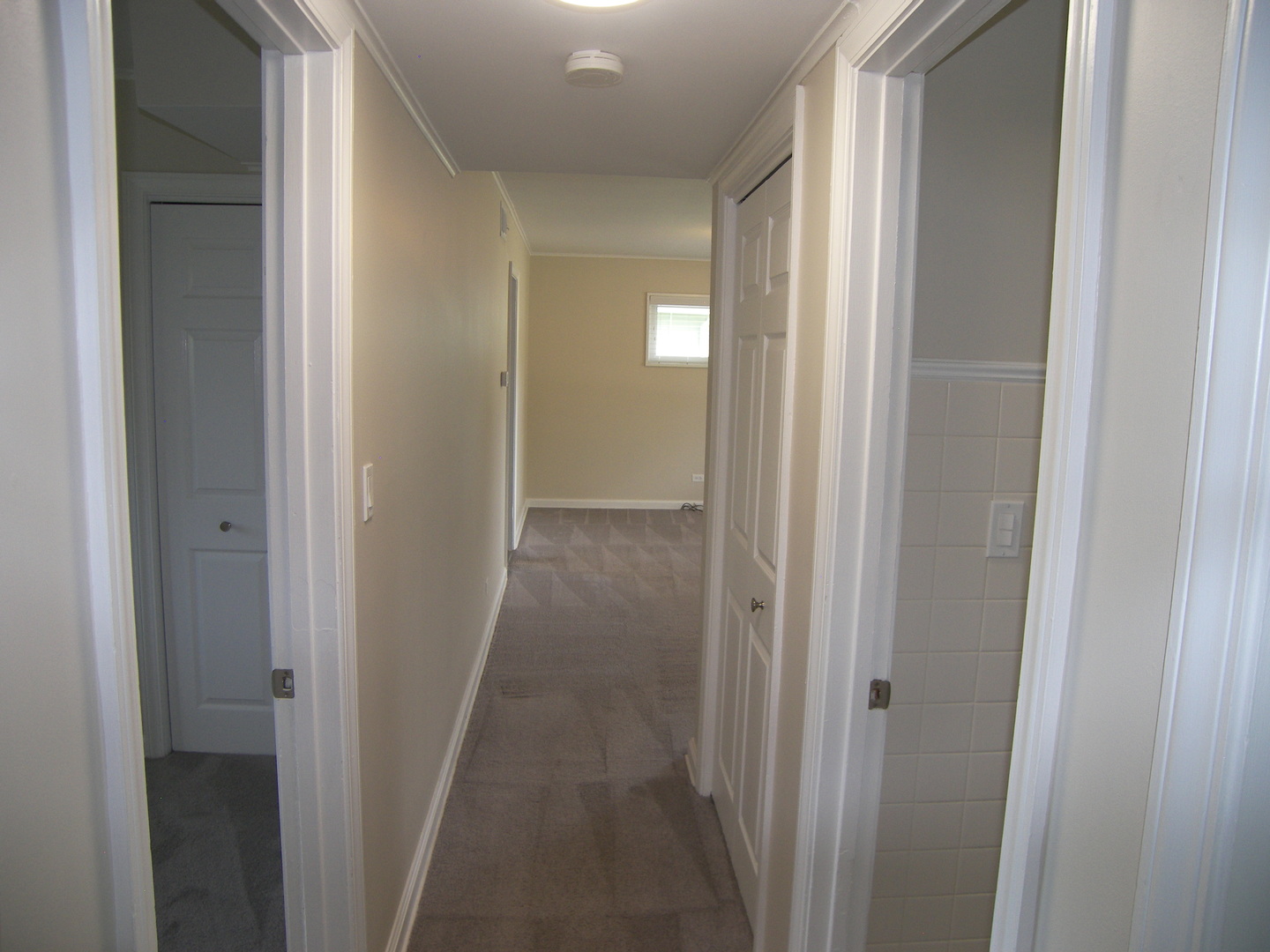 8 Crescent Road Lake Zurich, IL 60047 - Photo 9 of 17 a view of a hallway with wooden floor