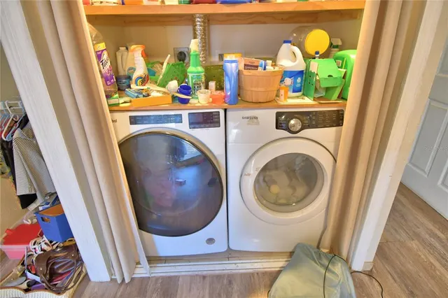 a utility room with dryer and washer