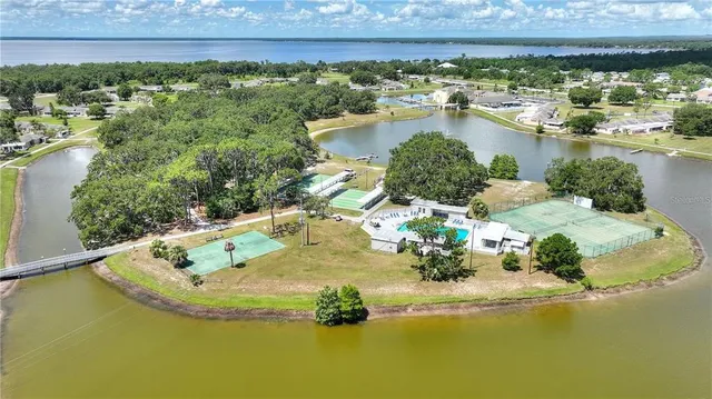 a view of a lake with a house