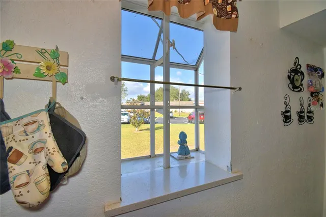 a view of a entryway door with wooden floor