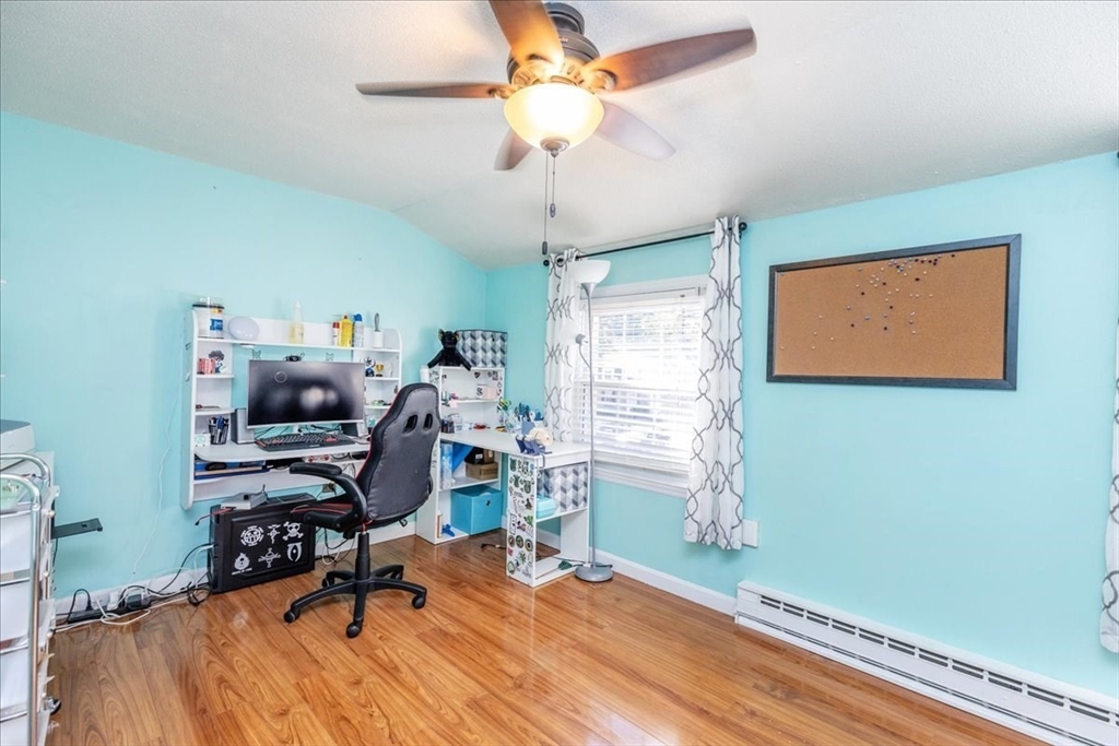 75 Sandy Pond Road, Unit 7 Ayer, MA 01432 - Photo 24 of 37 a view of a workspace with furniture and a window