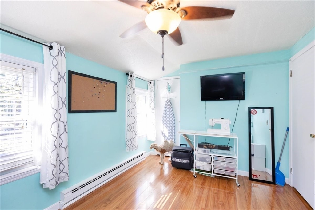 75 Sandy Pond Road, Unit 7 Ayer, MA 01432 - Photo 26 of 37 a living room with furniture and a flat screen tv