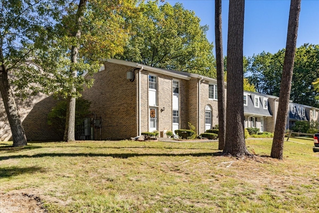 75 Sandy Pond Road, Unit 7 Ayer, MA 01432 - Photo 3 of 37 a view of house with tree s