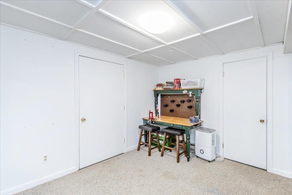 75 Sandy Pond Road, Unit 7 Ayer, MA 01432 - Photo 32 of 37 a view of a workspace with furniture
