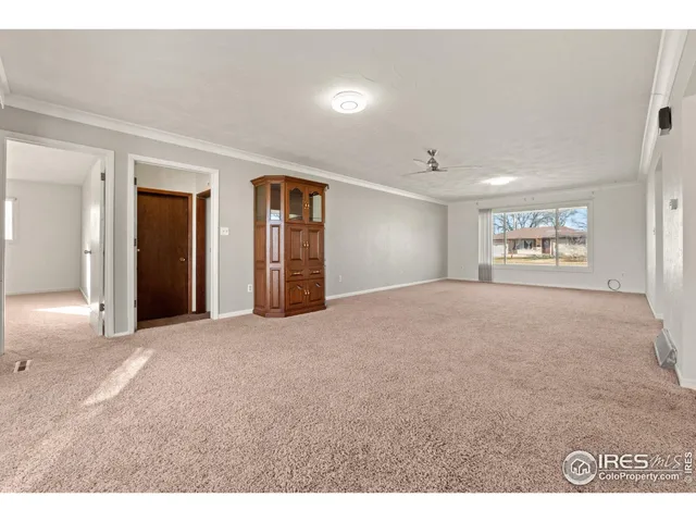a big room with windows and closet