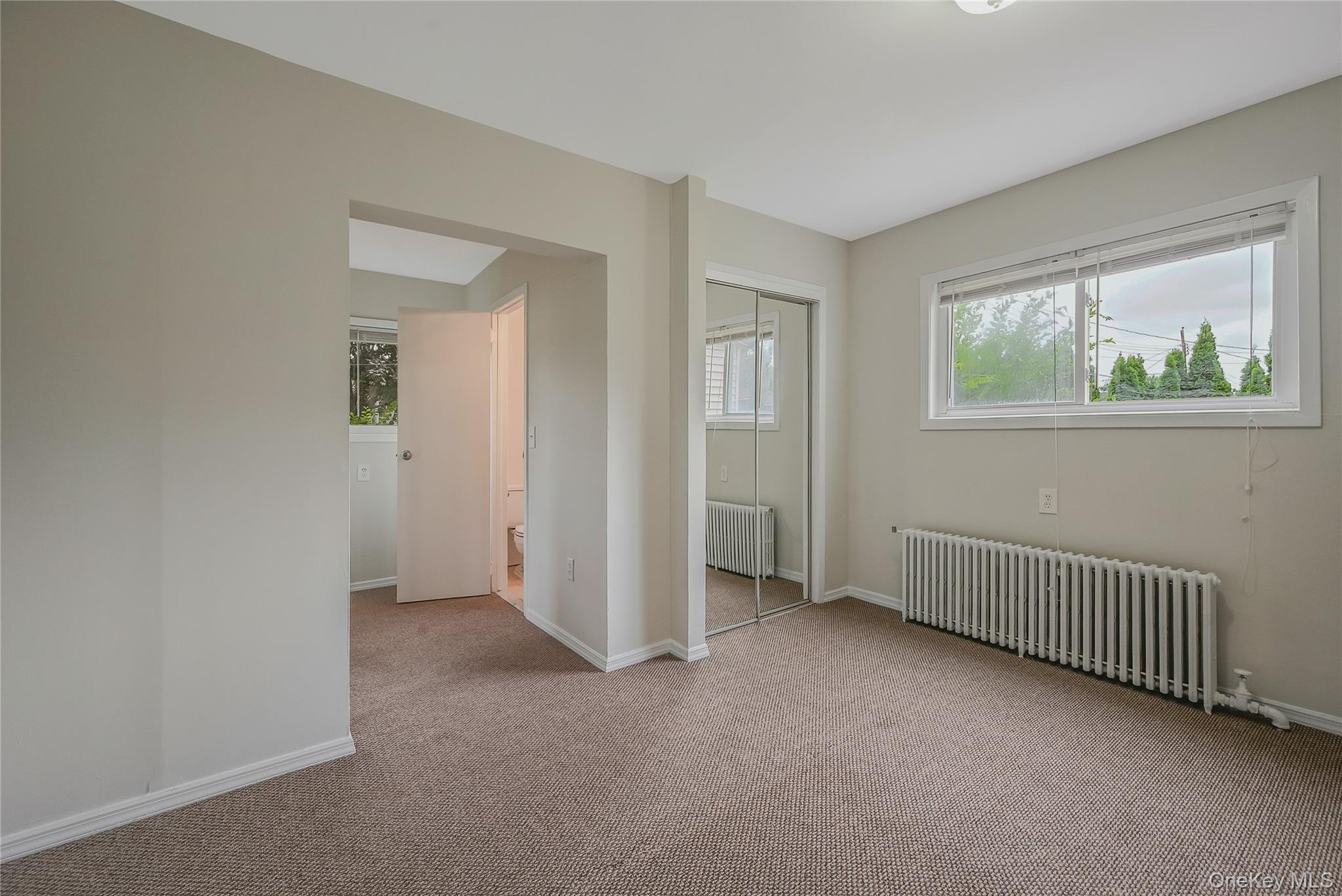 148 South 4th Street Bethpage, NY 11714 - Photo 13 of 16 an empty room with windows