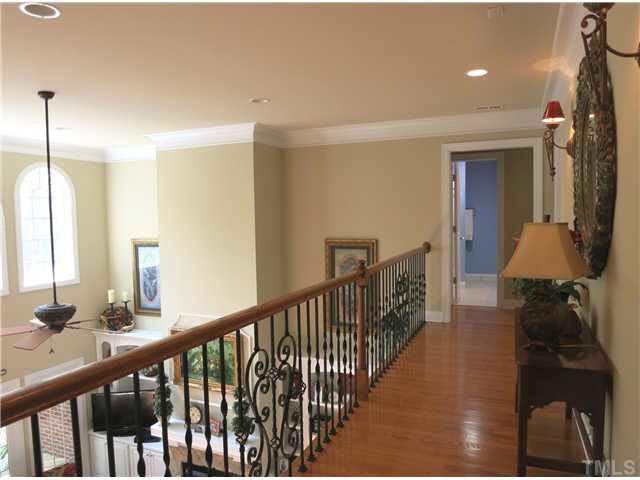 7209 Sparhawk Road Wake Forest, NC 27587 - Photo 15 of 25 An open walkway w/wrought iron balusters overlooks the Family Rm below. Other