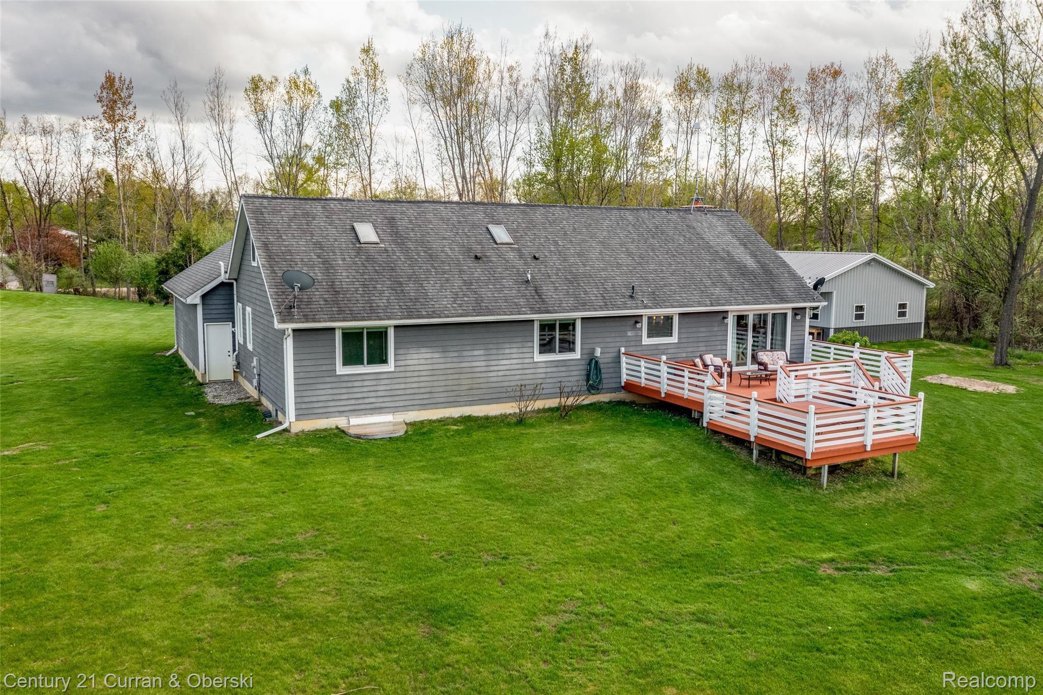 16920 Heim Road Chelsea, MI 48118 - Photo 33 of 48 Backyard with Big Deck
