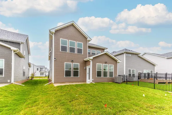 a view of a yard in front of a house