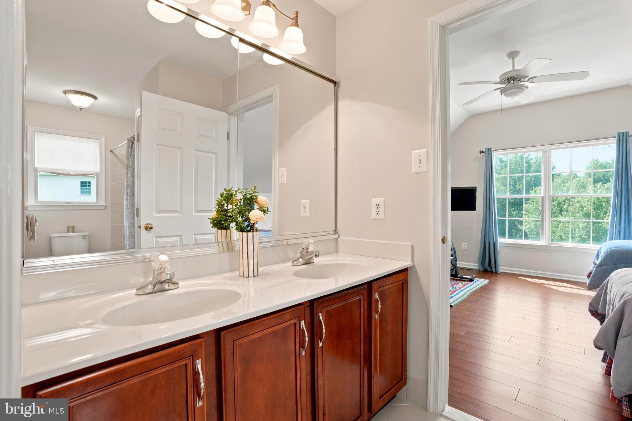 2303 Redtail Road Norristown, PA 19403 - Photo 31 of 53 a bathroom with a sink double vanity and a mirror