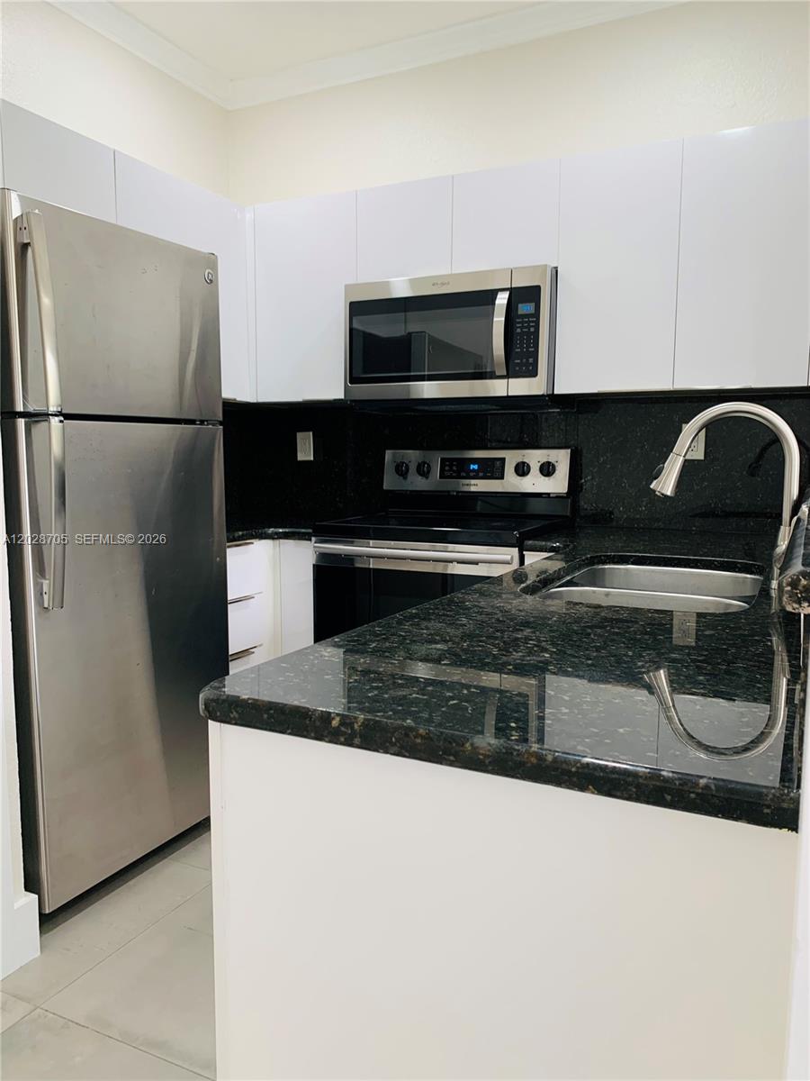 17650 Northwest 73rd Avenue, Unit 202 Hialeah, FL 33015 - Photo 2 of 19