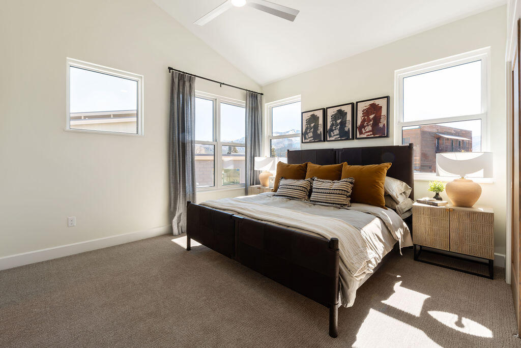 165 Riverfront Lane, Unit D3B Ridgway, CO 81432 - Photo 11 of 44 a bedroom with a bed and window