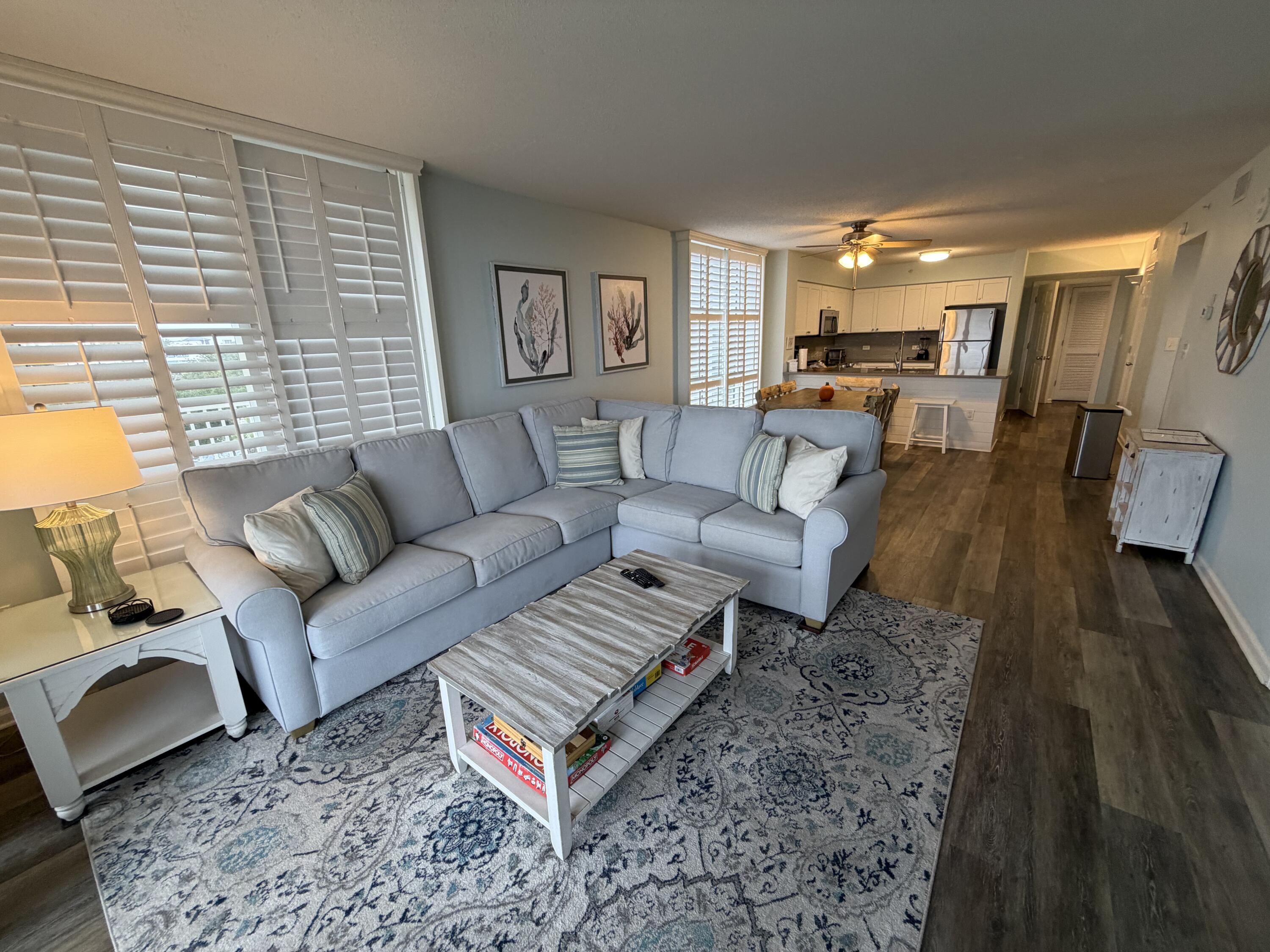 970 Highway 98, Unit 301 Destin, FL 32541 - Photo 3 of 18 a living room with furniture and a couch
